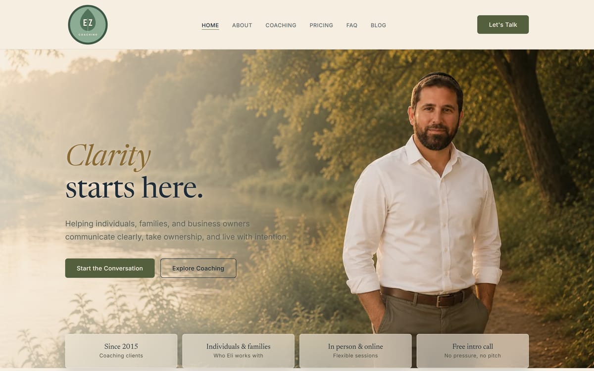 The EZ Coaching home page: a full-bleed environmental portrait of the coach beside a clear consultation call-to-action, on a warm, serif-led layout.